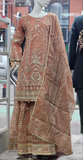 Ladies peach kameez and Gharara with intricate hand embellishments