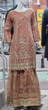 Ladies peach kameez and Gharara with intricate hand embellishments