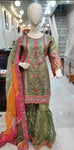 Ladies mint green kameez and Gharara with intricate hand embellishments