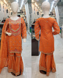 Ladies Orange kameez and Gharara with intricate hand embellishments