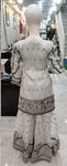 Ladies White kameez and Gharara with intricate hand embellishments